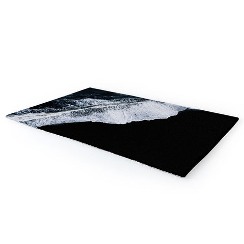 Michael Schauer Waves crashing on a black sand beach Area Rug