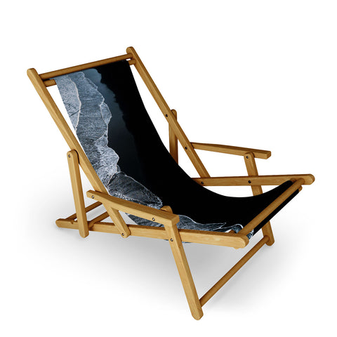 Michael Schauer Waves on a black sand beach Sling Chair
