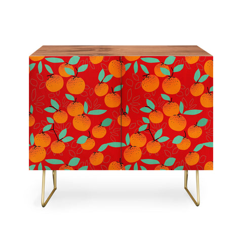 Mirimo Oranges on Red Credenza
