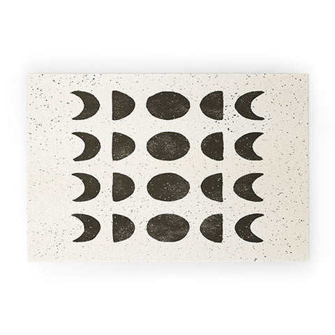 Pauline Stanley moon phases black cream Welcome Mat