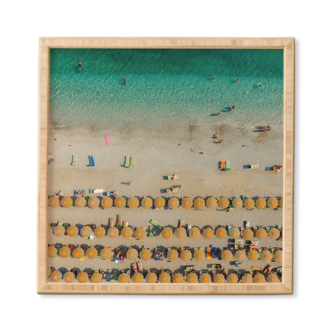 Pita Studios Colorful umbrellas at a beach Framed Wall Art