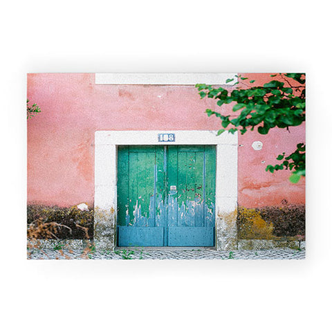 raisazwart Colorful door in Lisbon Portugal Welcome Mat