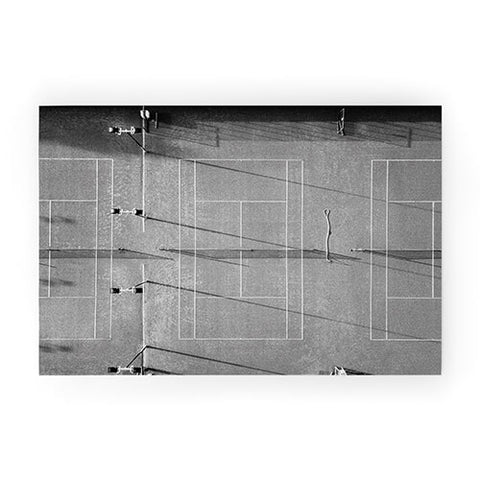 raisazwart Grey tennis court at sunrise Welcome Mat