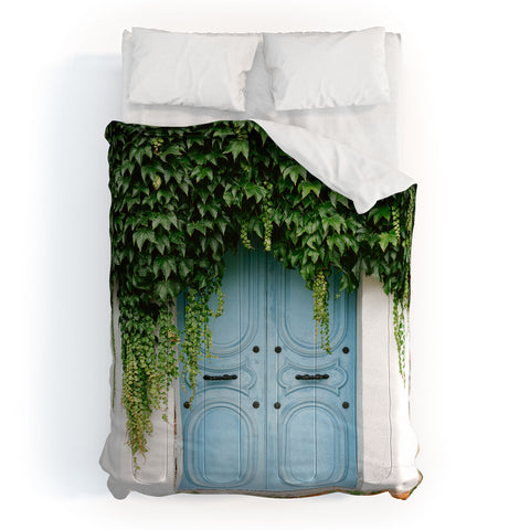 raisazwart The blue door of Montmartre Paris Comforter