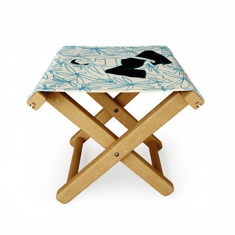 sandrapoliakov WOMAN IN A FIELD OF FLOWERS Folding Stool