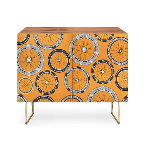 Sharon Turner bike wheels amber Credenza