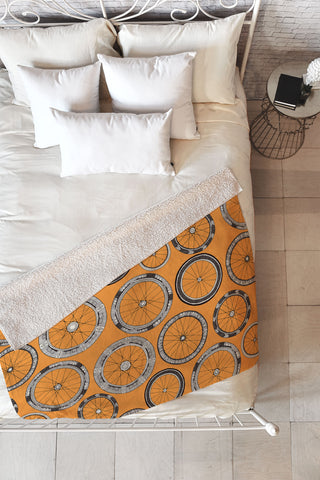 Sharon Turner bike wheels amber Fleece Throw Blanket