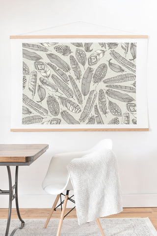 Sharon Turner scattered feathers natural Art Print And Hanger