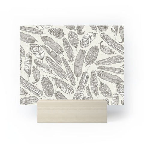 Sharon Turner scattered feathers natural Mini Art Print