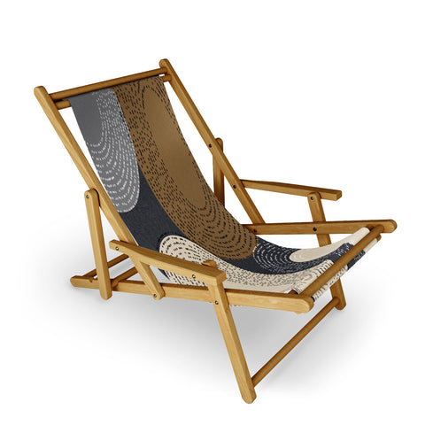 Sheila Wenzel-Ganny Minimalist Brown Circles Sling Chair
