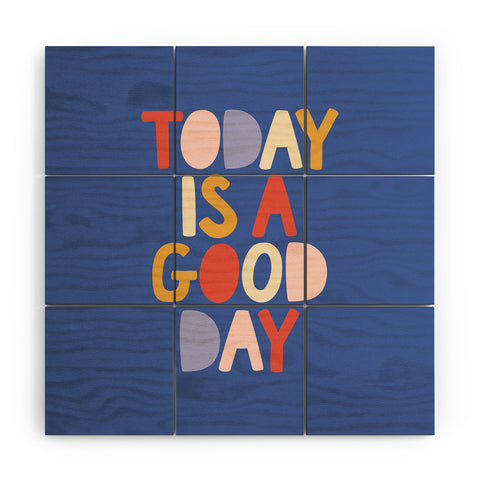 The Motivated Type Today is a Good Day in blue red peach pink and mustard yellow Wood Wall Mural