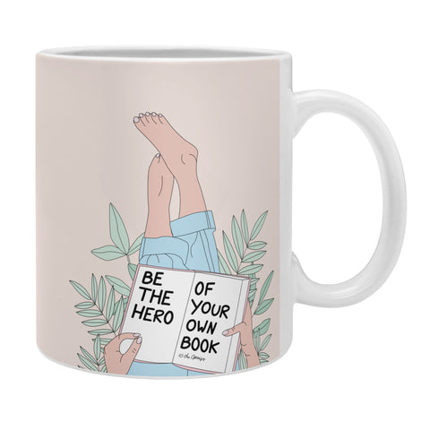 The Optimist Be The Hero Of Your Own Book Coffee Mug