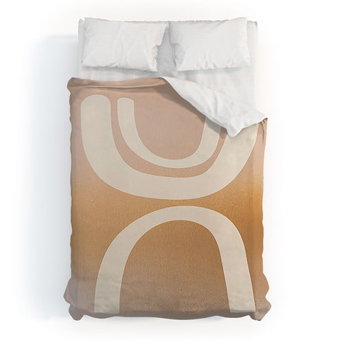 Urban Wild Studio sunrise arch Duvet Cover